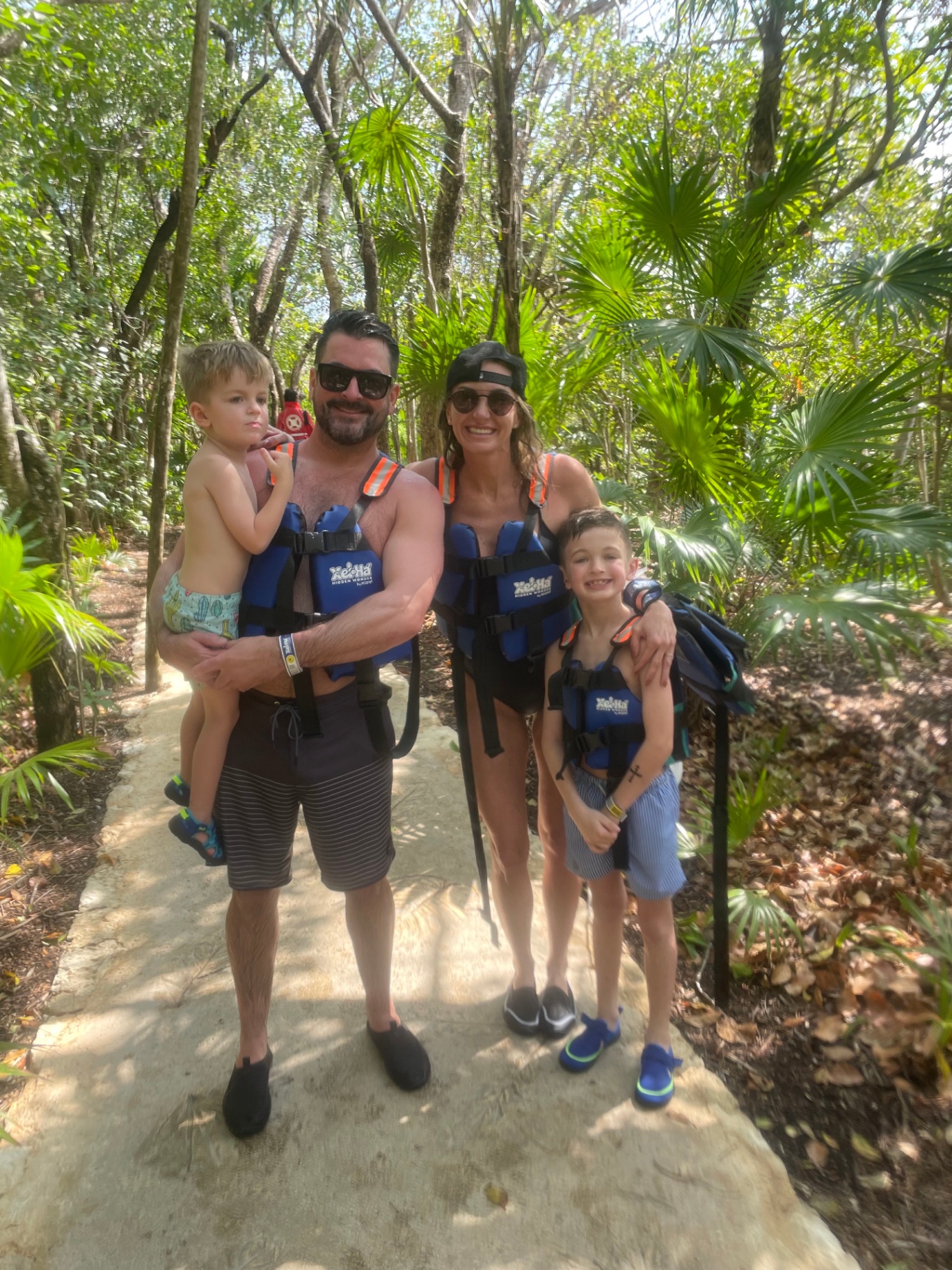 Laci with her husband and two boys on a family adventure